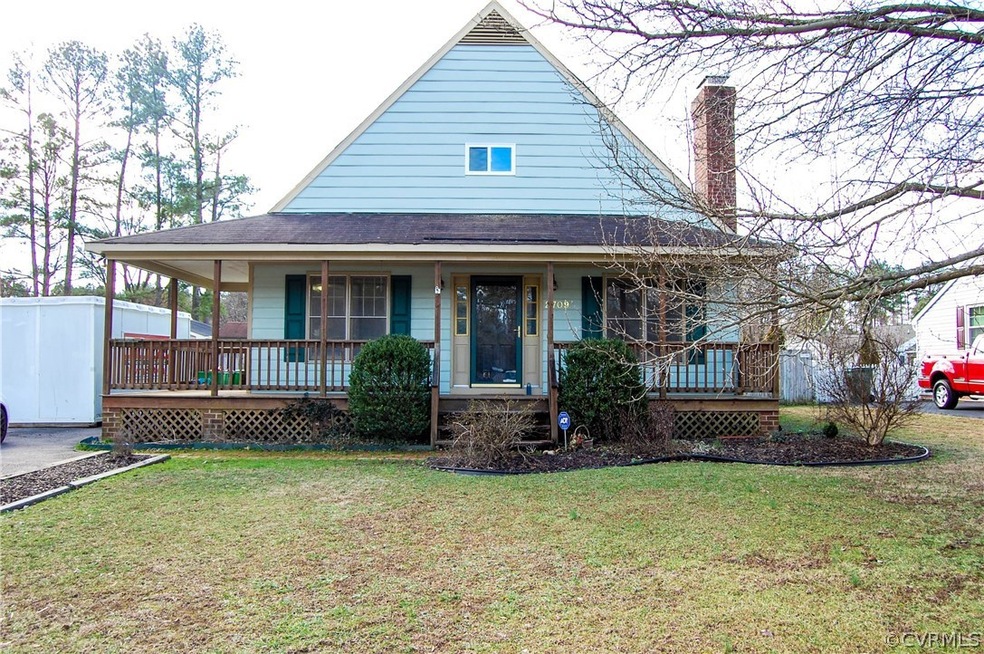 FRONT OF HOME   NOTE THE WRAP AROUND PORCH