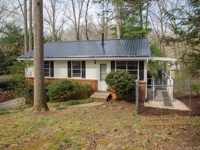 Great curb appeal with mature hardwood trees