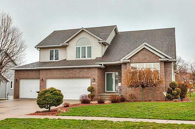 Exterior Front. Vinyl Siding with Brick front, 3 C