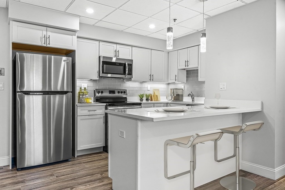 64 Foster St unit 203, Peabody, MA 01960 - photo 1