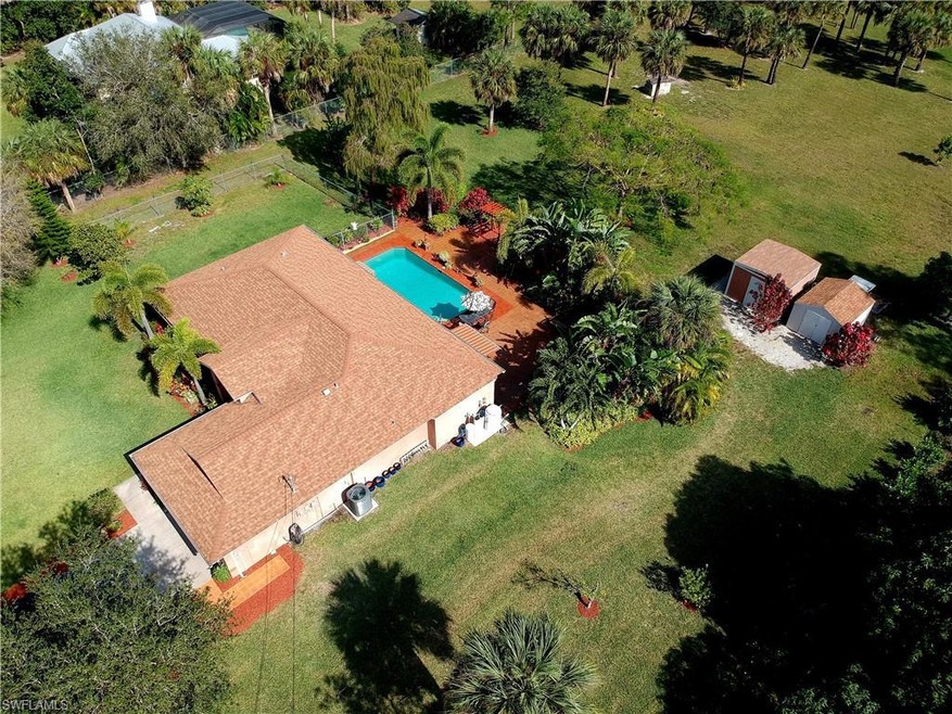 1180 27th St SW, Naples, FL 34117 - photo 1