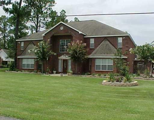 Exterior Front. Traditional estate style home is i