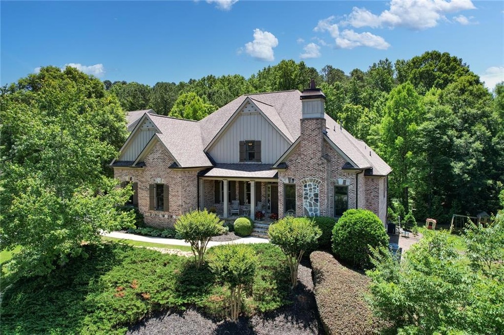 Four sided brick home with inviting front porch.