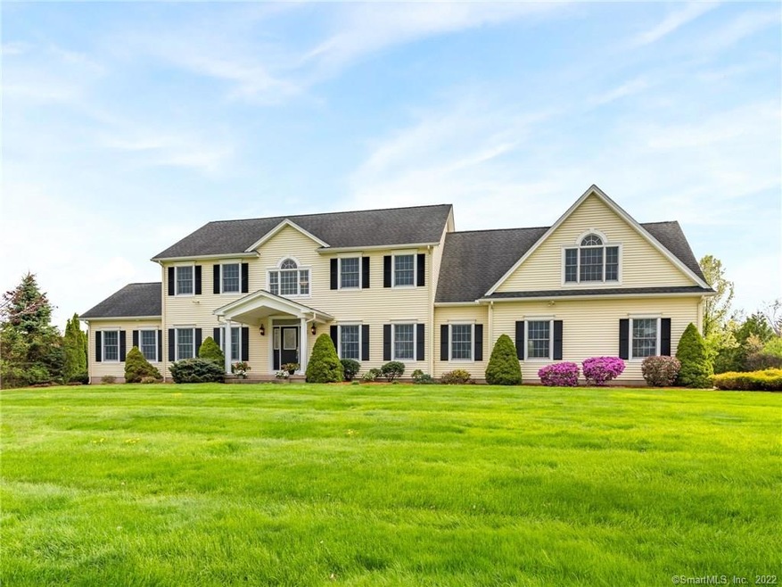 WELCOME HOME TO 15 HIGHLAND RIDGE DRIVE.