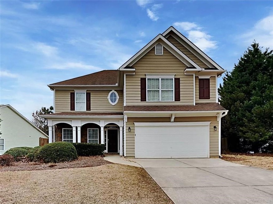 View of front of home featuring a garage