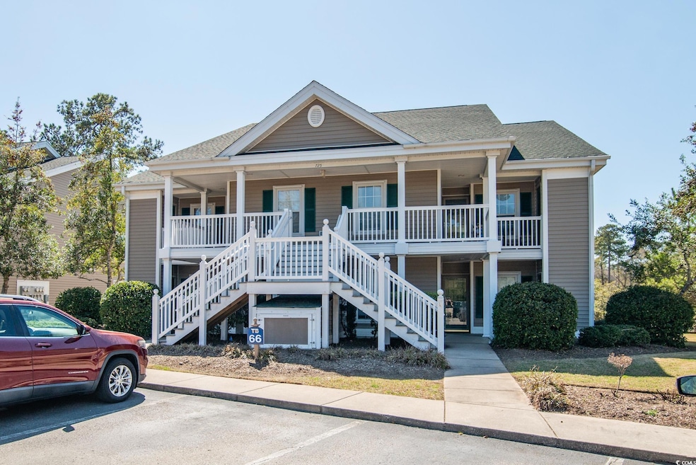 View of front facade with stairs, a porch, and a s