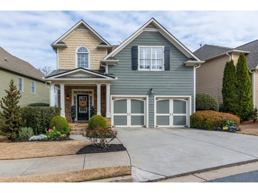Charming exterior with cedar shingles, stone, and 