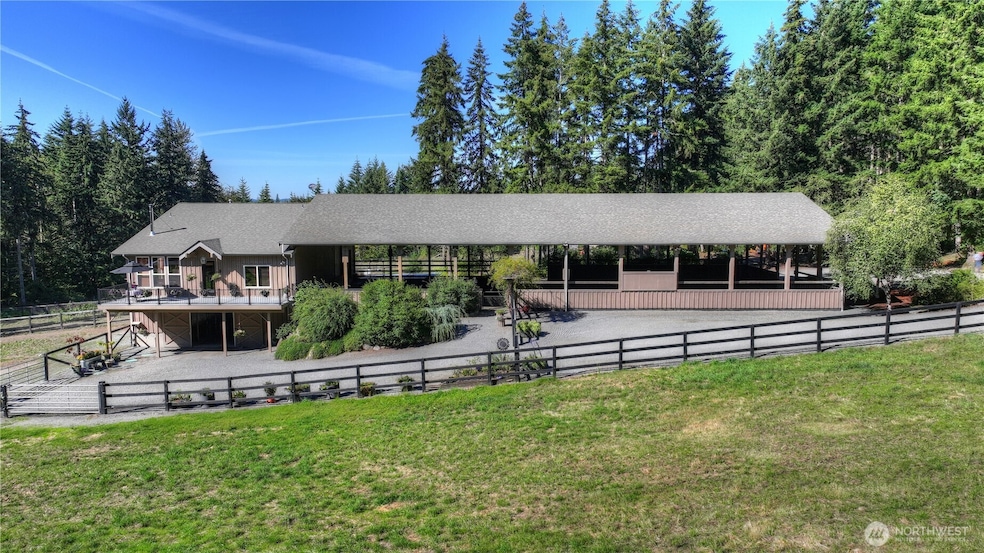 You will enjoy this Custom Architecturally Designed European Style Home built above daylight basement barn with adjoining covered arena perfectly sited on 20 magical acres - It's love at first sight!