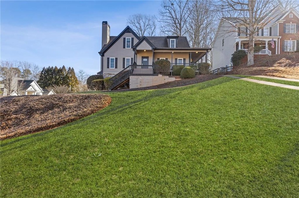 View of front of home featuring a porch and a fron