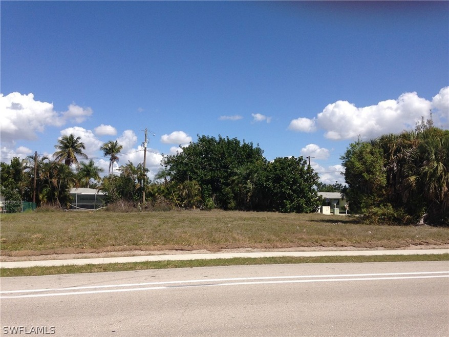 Looking at corner lot from median.