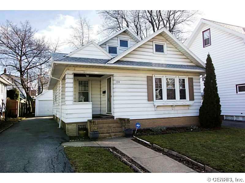 Exterior Front. Low maintenance siding and a repla