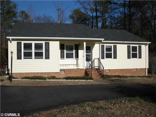 Exterior Front - Small porch, lamp post, freshly p
