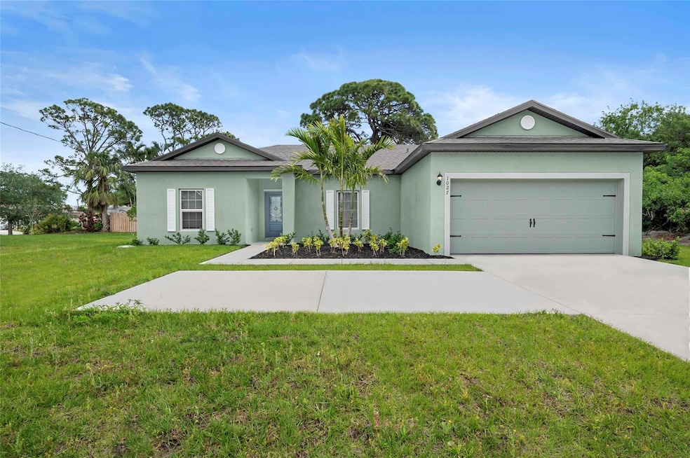 1027 SE Floresta Dr, Port St. Lucie, FL 34983 - photo 1