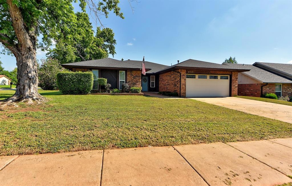 View of front of property featuring a garage and a