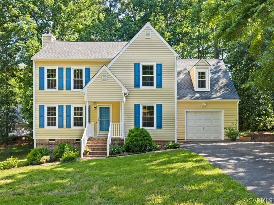 Maintenance free vinyl siding, paved driveway