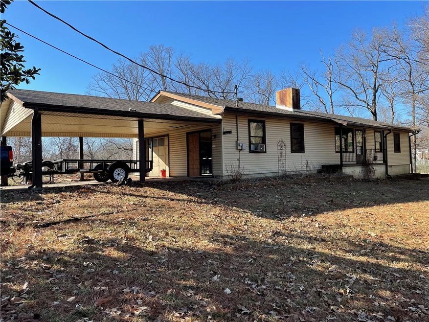 1 car garage and large carport New roof Feb 2022