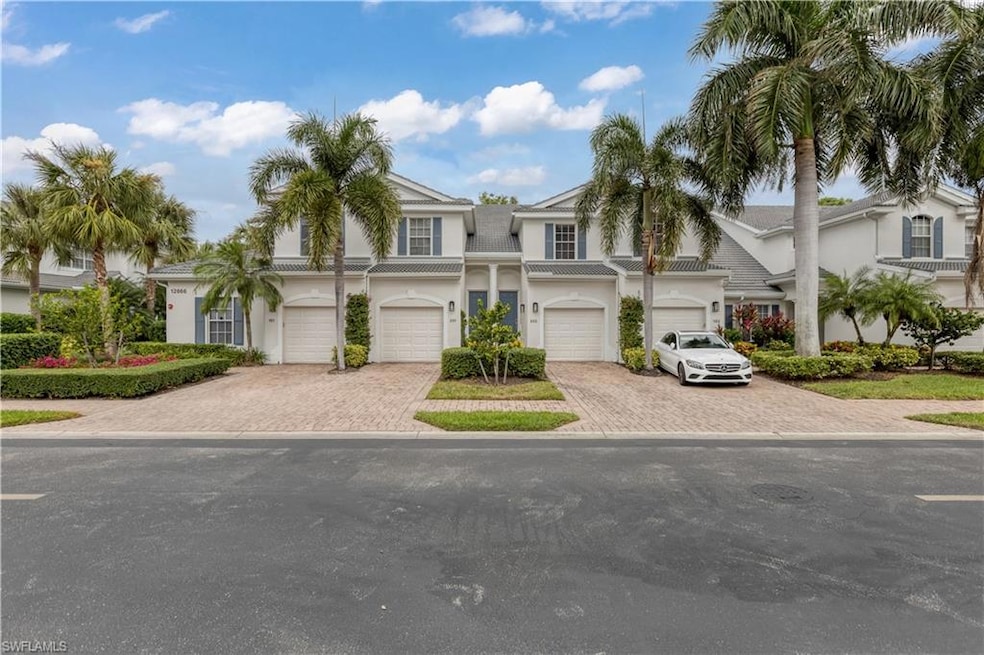 Multi unit property with a garage, driveway, and s