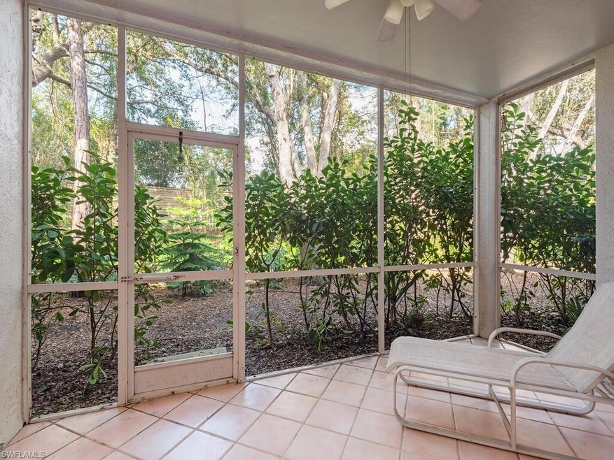 Unfurnished sunroom featuring ceiling fan