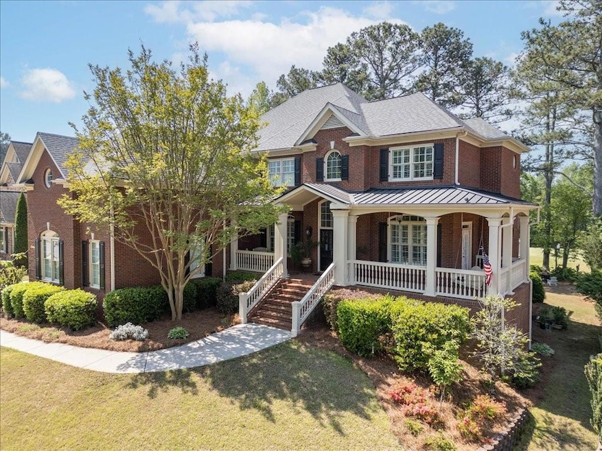 Craftsman-style house featuring stairway, covered 