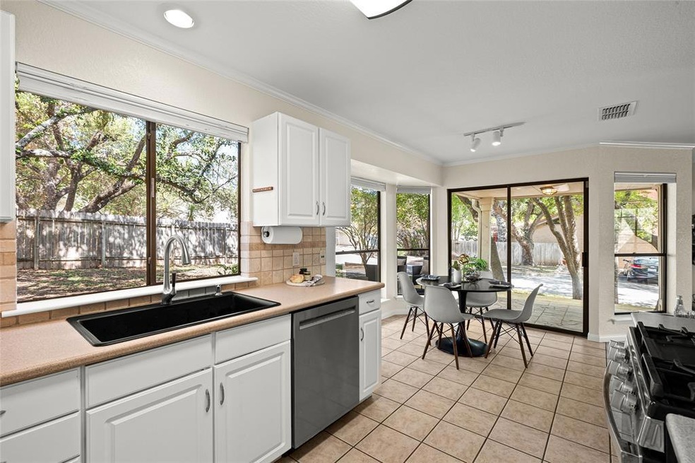 Tastefully updated kitchen with a wall of windows.