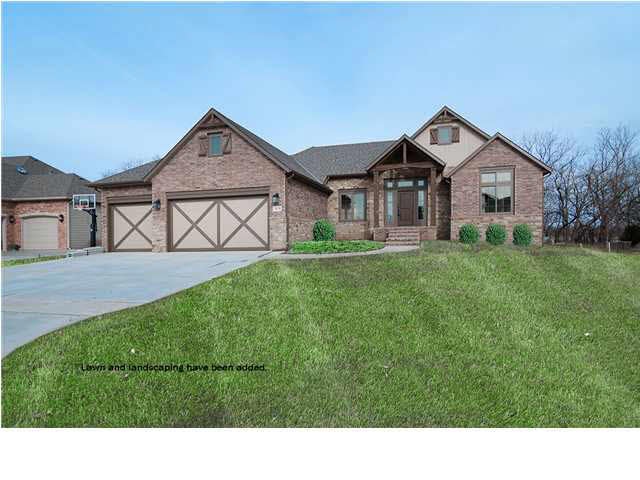 FRONT EXTERIOR W/DIGITALLY ADDED LAWN ( sprinkler 