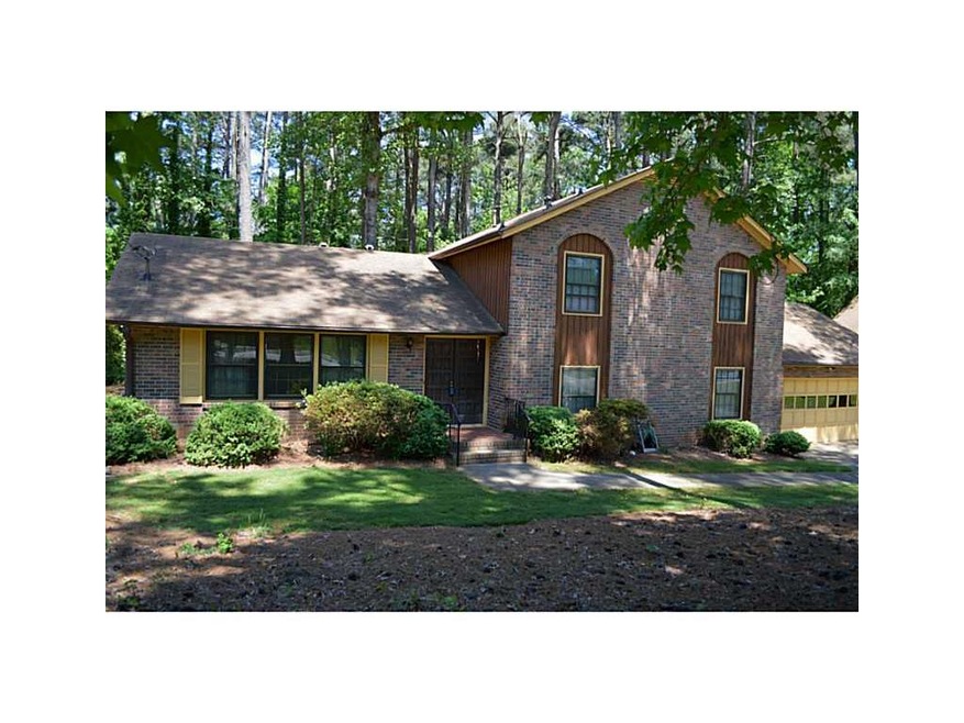 Exterior Front. Well manicured landscape brings lo