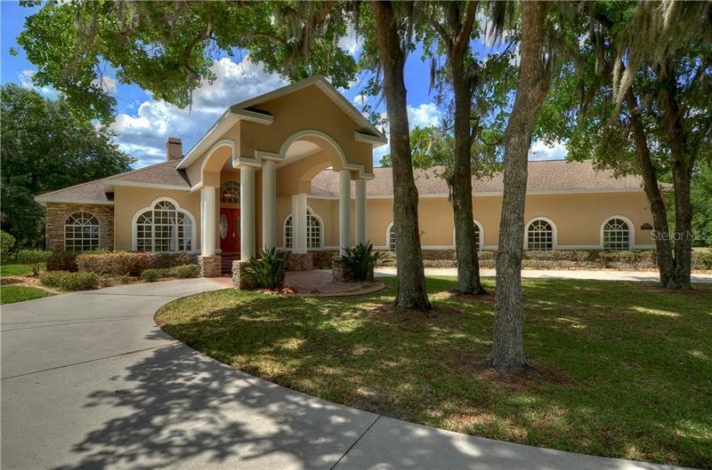 MAGNIFICENT traditional home lies on a 5.84 acre w