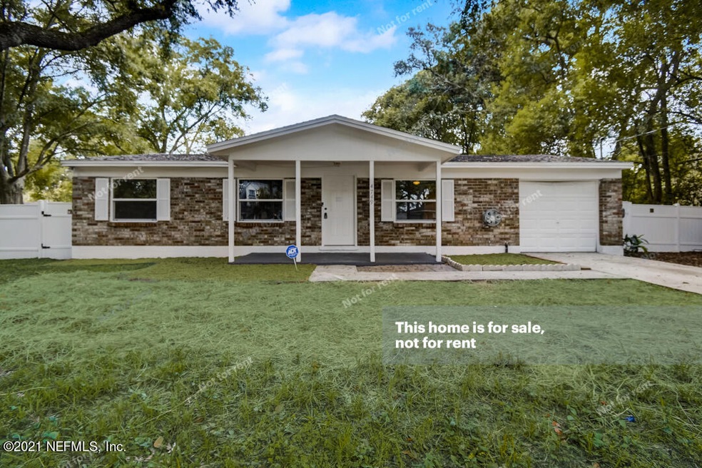 4749 Ricker Rd, Jacksonville, FL 32210 - photo 1