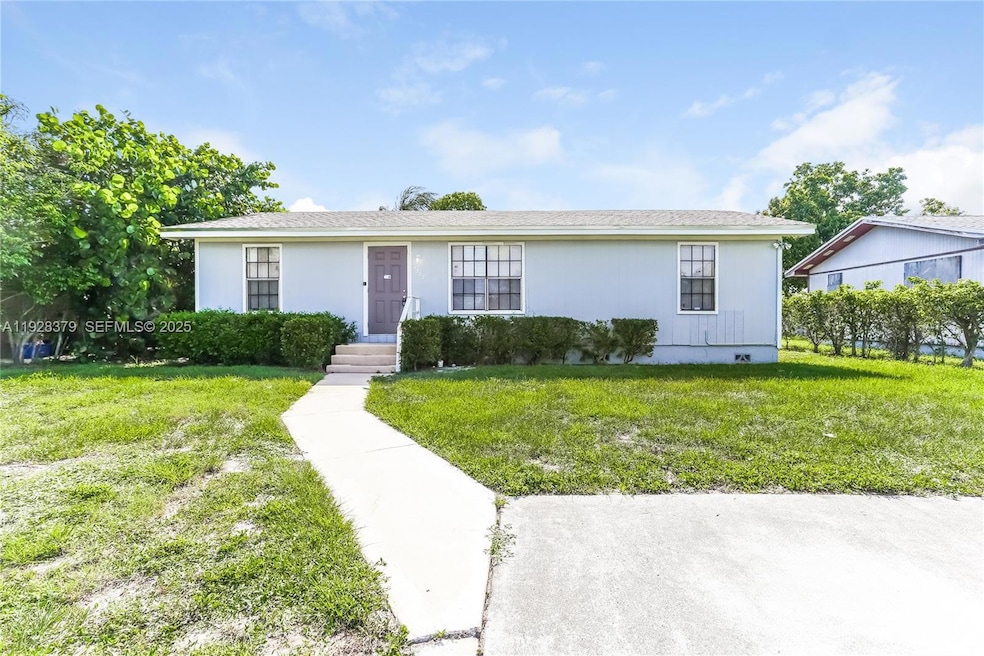 7303 Thatcher Ave, Lantana, FL 33462 - photo 1