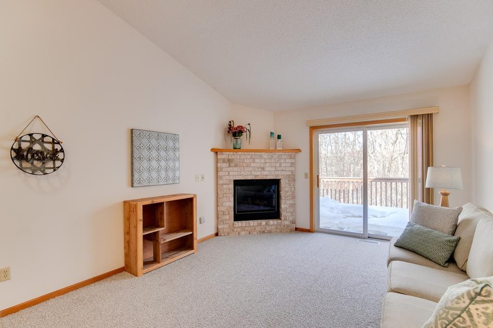 This spacious living room features a beautiful gas