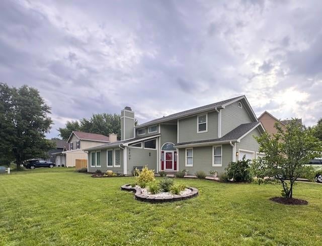 View of front facade with a front yard