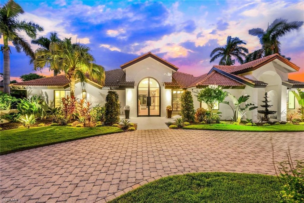 579 Neapolitan Way, Naples, FL 34103 - photo 1