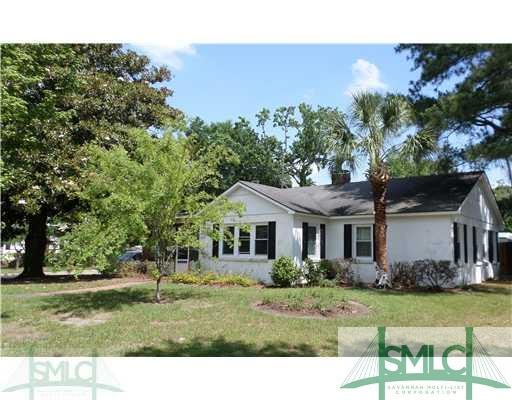 Exterior Front. Corner lot-  ALL NEW WINDOWS, priv