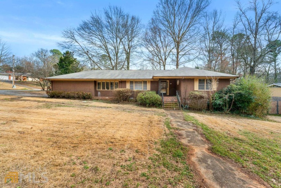 1409 Fairfield Dr SW, Lilburn, GA 30047 - photo 1