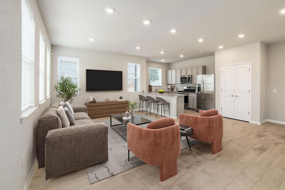 Large Living Room with open floor plan to kitchen - Virtually Staged