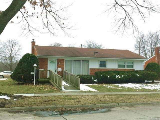 Well-maintained Livonia ranch on corner lot with d