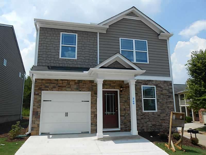 Exterior Front. brick accent front view