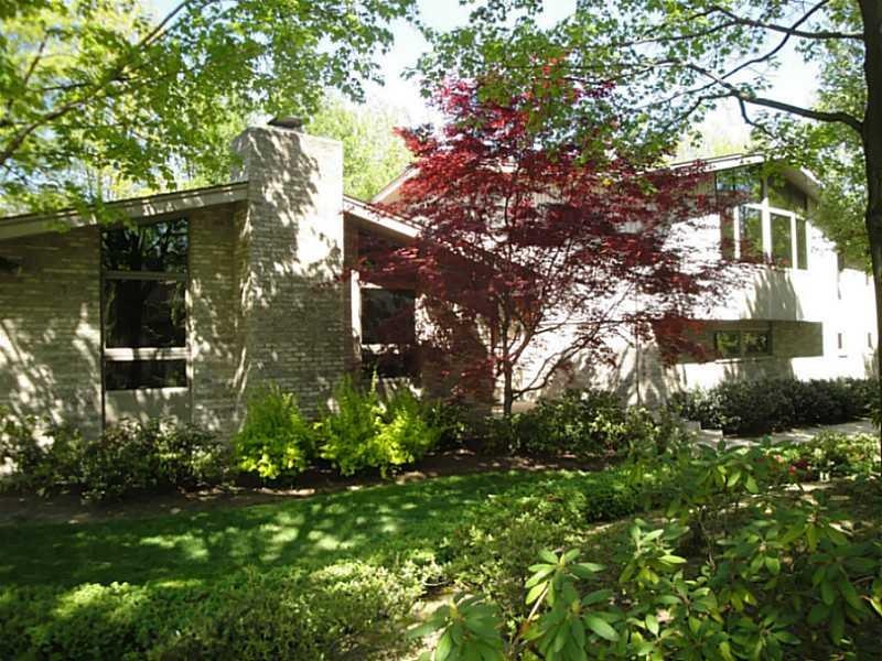 Exterior Front. Custom built multi-level contempor