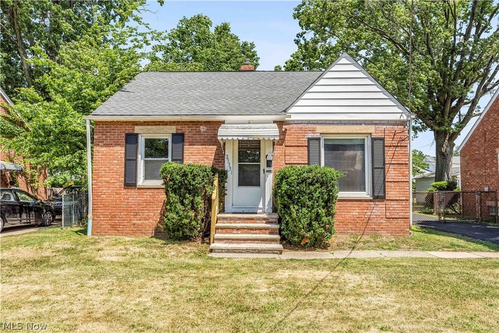 Bungalow-style home featuring a front lawn
