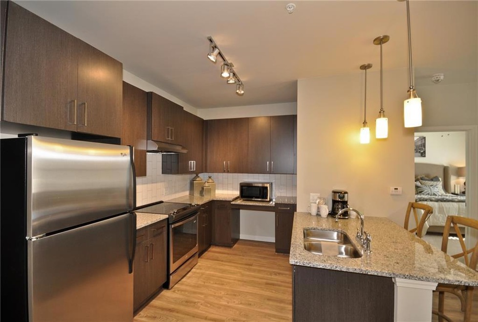 Kitchen featuring stainless steel appliances, a ki