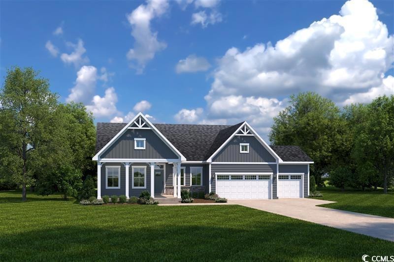 View of front of house with an attached garage, a front yard, driveway, a shingled roof, and board and batten siding