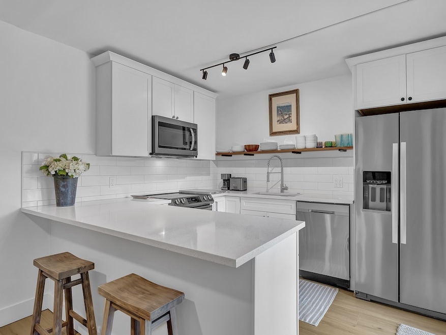 White Shaker Cabinets and Quartz Counters