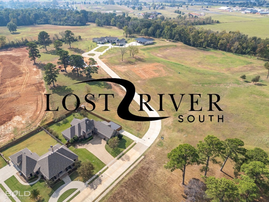Birds eye view of property featuring a rural view