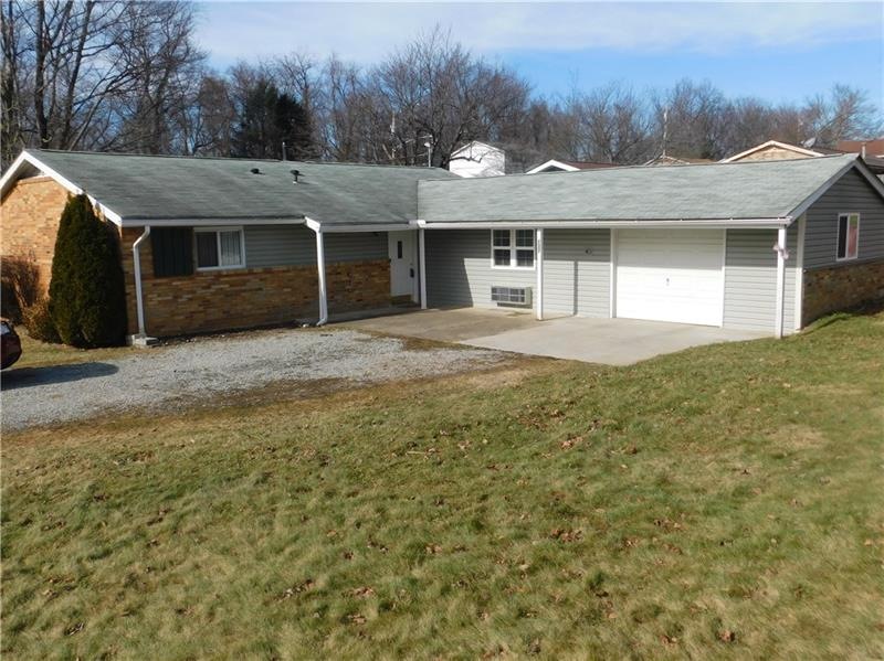 This wonderfully maintained no step ranch, located