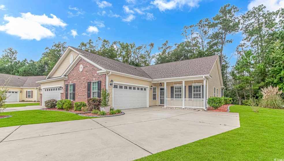 View of front of property with a front yard and a 