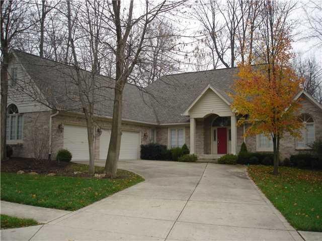Exterior Front. WELCOME HOME TO THIS CUSTOM BUILT RANCH IN THE VILLAGES OF PEBBLEBROOK. IMPRESSIVE ENTRY AND THREE CAR GARAGE ON WOODED LOT