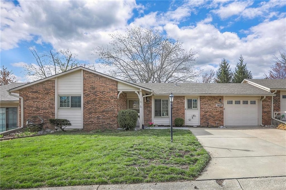 1407 W Stone Blvd, Raymore, MO 64083 - photo 1