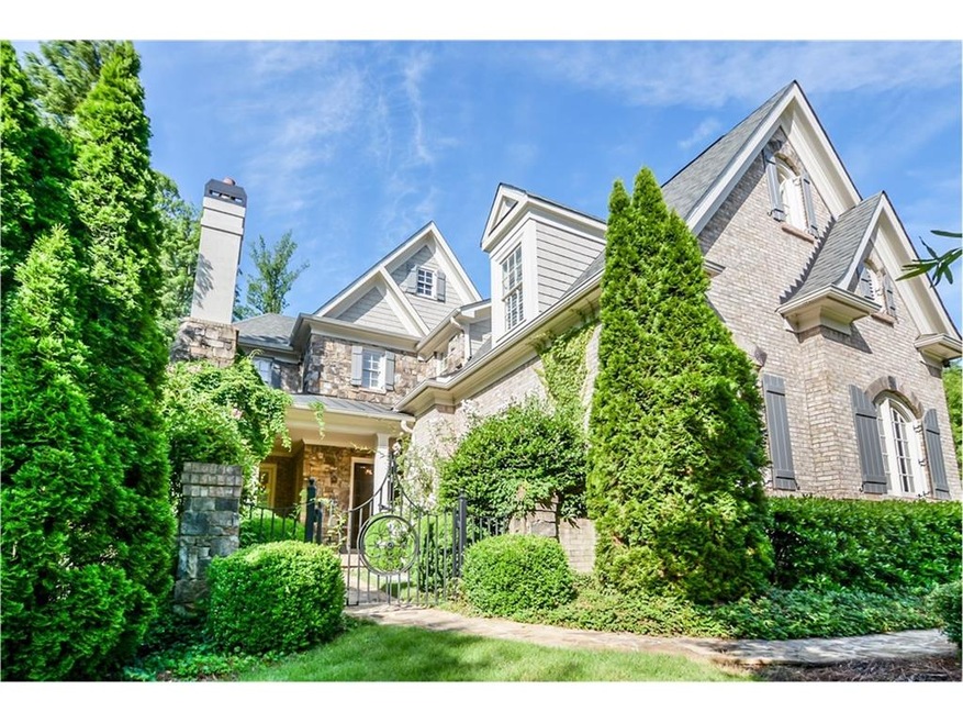 Four sides brick, three car garage, former model h