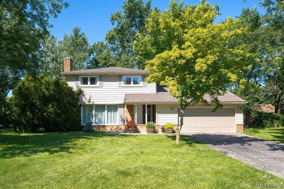 Updated West Bloomfield colonial on large lot.