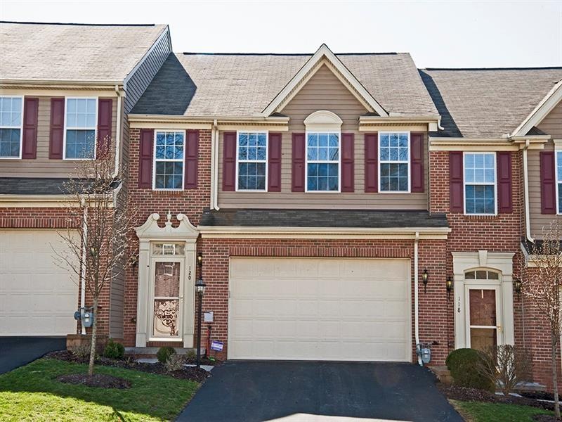 WELCOME HOME TO THIS CHARMING TOWNHOUSE WITH MANY 